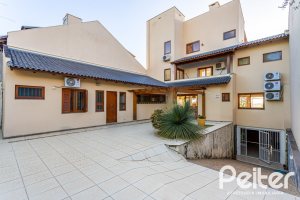 Casa à venda com 358m², 2 dormitórios, 2 suítes, 4 vagas, no bairro Jardim Isabel em Porto Alegre