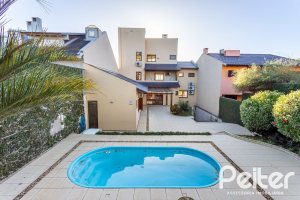Casa à venda com 358m², 2 dormitórios, 2 suítes, 4 vagas, no bairro Jardim Isabel em Porto Alegre