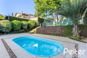 Casa à venda com 358m², 2 dormitórios, 2 suítes, 4 vagas, no bairro Jardim Isabel em Porto Alegre