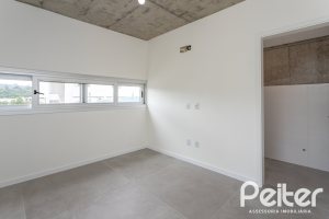 Casa em Condomínio à venda com 315m², 3 dormitórios, 3 suítes, 3 vagas, no bairro Alphaville em PORTO ALEGRE