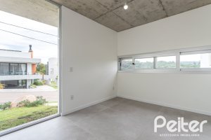 Casa em Condomínio à venda com 315m², 3 dormitórios, 3 suítes, 3 vagas, no bairro Alphaville em PORTO ALEGRE