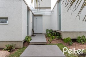 Casa em Condomínio à venda com 315m², 3 dormitórios, 3 suítes, 3 vagas, no bairro Alphaville em PORTO ALEGRE