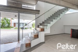 Casa em Condomínio à venda com 315m², 3 dormitórios, 3 suítes, 3 vagas, no bairro Alphaville em PORTO ALEGRE