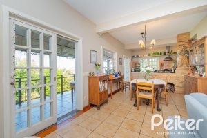 Casa à venda com 352m², 3 dormitórios, 1 suíte, 4 vagas, no bairro Belém Novo em Porto Alegre