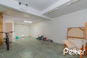 Casa em Condomínio à venda com 252m², 3 dormitórios, 2 suítes, 3 vagas, no bairro Vila Assunção em Porto Alegre