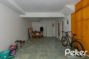 Casa em Condomínio à venda com 252m², 3 dormitórios, 2 suítes, 3 vagas, no bairro Vila Assunção em Porto Alegre
