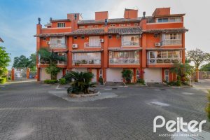 Casa em Condomínio à venda com 252m², 3 dormitórios, 2 suítes, 3 vagas, no bairro Vila Assunção em Porto Alegre