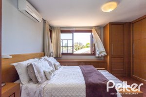 Casa em Condomínio à venda com 219m², 3 dormitórios, 1 suíte, 2 vagas, no bairro Tristeza em Porto Alegre