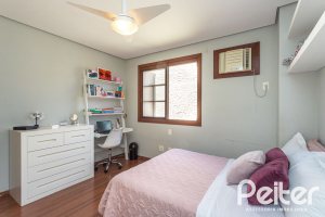 Casa em Condomínio à venda com 219m², 3 dormitórios, 1 suíte, 2 vagas, no bairro Tristeza em Porto Alegre