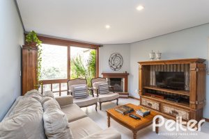 Casa em Condomínio à venda com 219m², 3 dormitórios, 1 suíte, 2 vagas, no bairro Tristeza em Porto Alegre