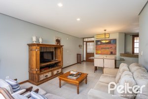 Casa em Condomínio à venda com 219m², 3 dormitórios, 1 suíte, 2 vagas, no bairro Tristeza em Porto Alegre