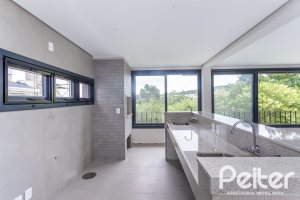 Casa em Condomínio à venda com 279m², 3 dormitórios, 3 suítes, 4 vagas, no bairro Alphaville em PORTO ALEGRE