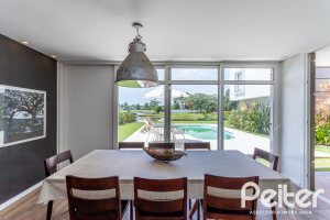 Casa em Condomínio à venda com 418m², 3 dormitórios, 3 suítes, 6 vagas, no bairro Terra Ville em PORTO ALEGRE