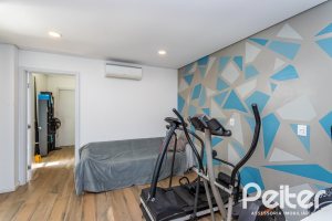 Casa em Condomínio à venda com 418m², 3 dormitórios, 3 suítes, 6 vagas, no bairro Terra Ville em PORTO ALEGRE