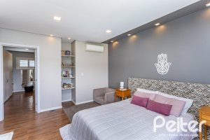 Casa em Condomínio à venda com 418m², 3 dormitórios, 3 suítes, 6 vagas, no bairro Terra Ville em PORTO ALEGRE