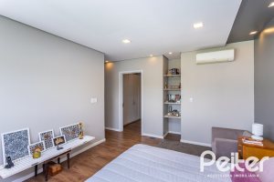 Casa em Condomínio à venda com 418m², 3 dormitórios, 3 suítes, 6 vagas, no bairro Terra Ville em PORTO ALEGRE