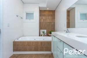 Casa em Condomínio à venda com 418m², 3 dormitórios, 3 suítes, 6 vagas, no bairro Terra Ville em PORTO ALEGRE