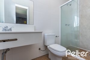 Casa em Condomínio à venda com 418m², 3 dormitórios, 3 suítes, 6 vagas, no bairro Terra Ville em PORTO ALEGRE