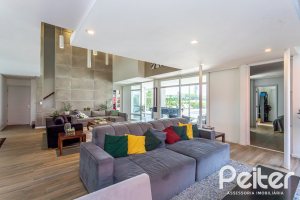 Casa em Condomínio à venda com 418m², 3 dormitórios, 3 suítes, 6 vagas, no bairro Terra Ville em PORTO ALEGRE