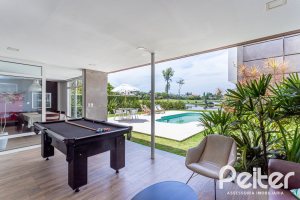 Casa em Condomínio à venda com 418m², 3 dormitórios, 3 suítes, 6 vagas, no bairro Terra Ville em PORTO ALEGRE