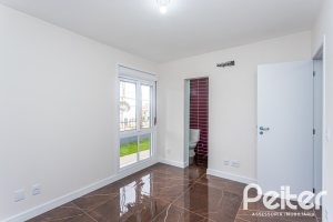 Casa em Condomínio à venda com 153m², 3 dormitórios, 3 suítes, 3 vagas, no bairro Mountain Ville em PORTO ALEGRE