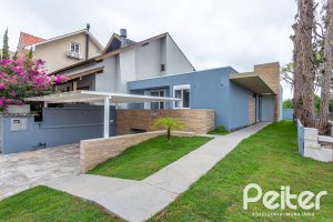Casa em Condomínio à venda com 153m², 3 dormitórios, 3 suítes, 3 vagas, no bairro Mountain Ville em PORTO ALEGRE