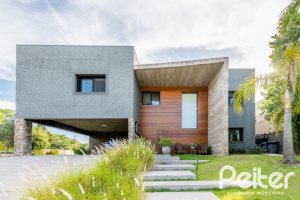 Casa em Condomínio à venda com 550m², 5 dormitórios, 4 suítes, 4 vagas, no bairro Terra Ville em PORTO ALEGRE