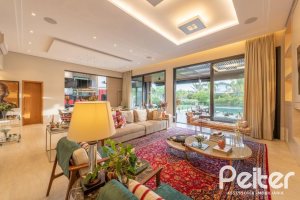 Casa em Condomínio à venda com 550m², 5 dormitórios, 4 suítes, 4 vagas, no bairro Terra Ville em PORTO ALEGRE