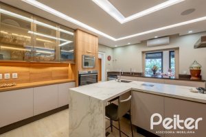 Casa em Condomínio à venda com 550m², 5 dormitórios, 4 suítes, 4 vagas, no bairro Terra Ville em PORTO ALEGRE