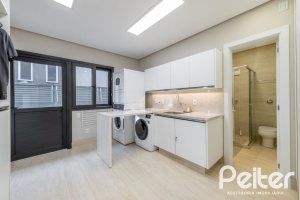 Casa em Condomínio à venda com 550m², 5 dormitórios, 4 suítes, 4 vagas, no bairro Terra Ville em PORTO ALEGRE