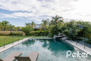 Casa em Condomínio à venda com 550m², 5 dormitórios, 4 suítes, 4 vagas, no bairro Terra Ville em PORTO ALEGRE