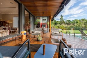 Casa em Condomínio à venda com 550m², 5 dormitórios, 4 suítes, 4 vagas, no bairro Terra Ville em PORTO ALEGRE