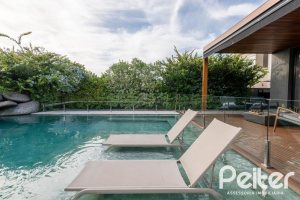 Casa em Condomínio à venda com 550m², 5 dormitórios, 4 suítes, 4 vagas, no bairro Terra Ville em PORTO ALEGRE