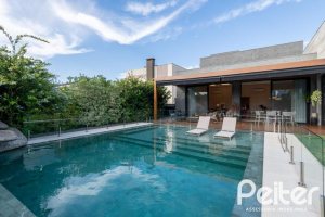 Casa em Condomínio à venda com 550m², 5 dormitórios, 4 suítes, 4 vagas, no bairro Terra Ville em PORTO ALEGRE