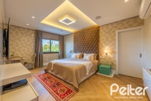 Casa em Condomínio à venda com 550m², 5 dormitórios, 4 suítes, 4 vagas, no bairro Terra Ville em PORTO ALEGRE