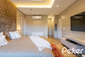 Casa em Condomínio à venda com 550m², 5 dormitórios, 4 suítes, 4 vagas, no bairro Terra Ville em PORTO ALEGRE