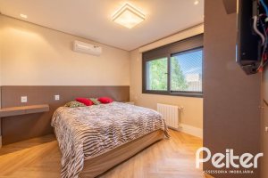 Casa em Condomínio à venda com 550m², 5 dormitórios, 4 suítes, 4 vagas, no bairro Terra Ville em PORTO ALEGRE