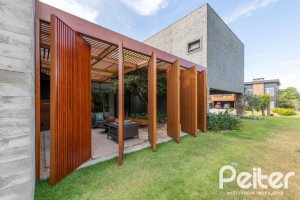 Casa em Condomínio à venda com 550m², 5 dormitórios, 4 suítes, 4 vagas, no bairro Terra Ville em PORTO ALEGRE