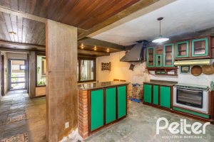 Casa à venda com 349m², 5 dormitórios, 1 suíte, 4 vagas, no bairro Vila Assunção em Porto Alegre