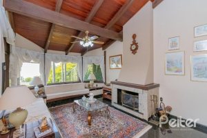 Casa à venda com 430m², 3 dormitórios, 2 suítes, 4 vagas, no bairro Vila Assunção em Porto Alegre