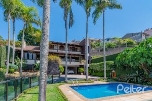 Casa à venda com 430m², 3 dormitórios, 2 suítes, 4 vagas, no bairro Vila Assunção em Porto Alegre