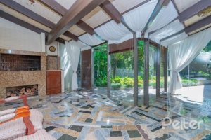 Casa à venda com 430m², 3 dormitórios, 2 suítes, 4 vagas, no bairro Vila Assunção em Porto Alegre