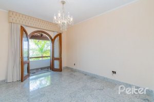 Casa à venda com 430m², 3 dormitórios, 2 suítes, 4 vagas, no bairro Vila Assunção em Porto Alegre