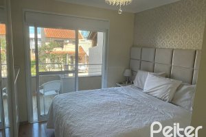 Casa em Condomínio à venda com 132m², 2 dormitórios, 1 suíte, 1 vaga, no bairro Hípica em Porto Alegre