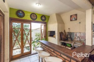 Casa em Condomínio à venda com 255m², 3 dormitórios, 1 suíte, 4 vagas, no bairro Jardim Isabel em Porto Alegre