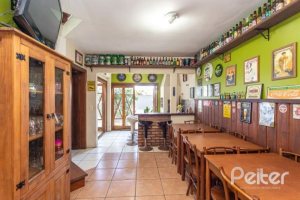 Casa em Condomínio à venda com 255m², 3 dormitórios, 1 suíte, 4 vagas, no bairro Jardim Isabel em Porto Alegre