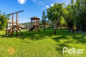 Casa em Condomínio à venda com 560m², 5 dormitórios, 2 suítes, 5 vagas, no bairro Campo Novo em Porto Alegre