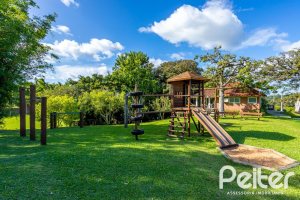 Casa em Condomínio à venda com 560m², 5 dormitórios, 2 suítes, 5 vagas, no bairro Campo Novo em Porto Alegre