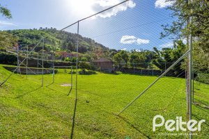 Casa em Condomínio à venda com 560m², 5 dormitórios, 2 suítes, 5 vagas, no bairro Campo Novo em Porto Alegre