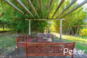 Casa em Condomínio à venda com 560m², 5 dormitórios, 2 suítes, 5 vagas, no bairro Campo Novo em Porto Alegre